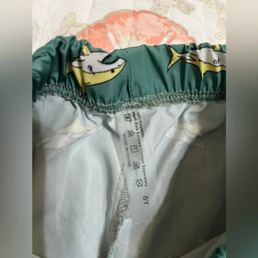 (8) Green and yellow shark shorts with pockets